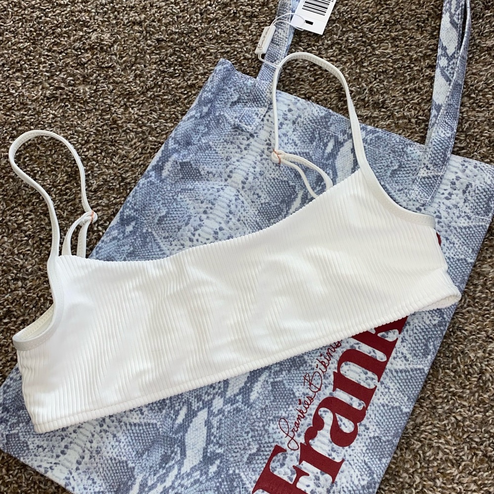 Frankie’s white boots top